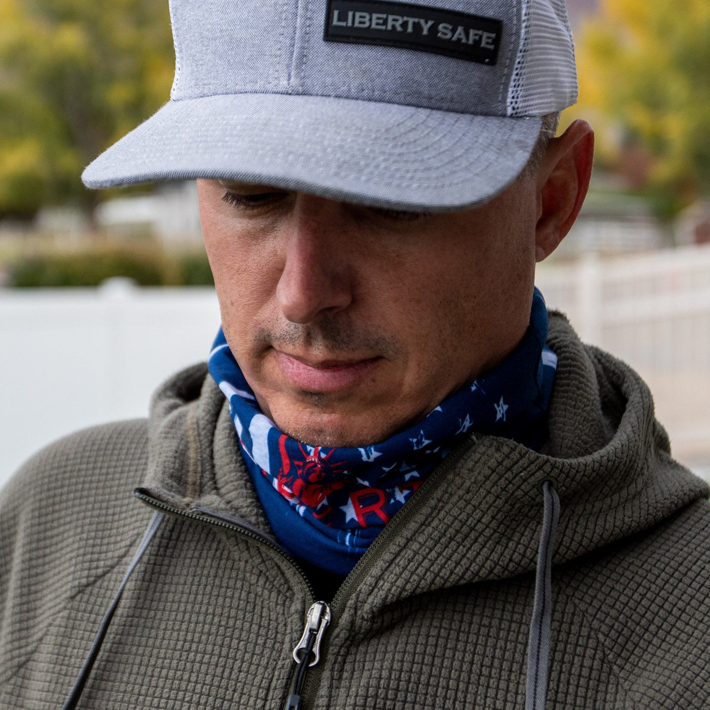 Man wearing Liberty Safe neck gaiter over neck